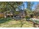 Spacious backyard featuring a stone patio with outdoor seating, a private retreat for relaxation and entertainment at 595 Ridgecrest Ne Rd, Atlanta, GA 30307