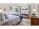 Bright bedroom with hardwood floors and a cozy sitting area at 595 Ridgecrest Ne Rd, Atlanta, GA 30307