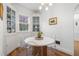 Charming breakfast nook featuring built-in display cabinets and a cozy round table at 595 Ridgecrest Ne Rd, Atlanta, GA 30307