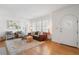 Beautiful living room with hardwood floors, neutral paint, plantation shutters and lots of natural light at 595 Ridgecrest Ne Rd, Atlanta, GA 30307