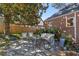 Inviting stone patio with outdoor seating, perfect for entertaining guests and enjoying the peaceful backyard ambiance at 595 Ridgecrest Ne Rd, Atlanta, GA 30307