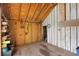 View of the interior of shed and outdoor tools with wood walls and exposed wood beams at 595 Ridgecrest Ne Rd, Atlanta, GA 30307