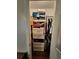 Walk-in closet is designed with shelving and tiered drawers at 11250 Bramshill Dr, Johns Creek, GA 30022