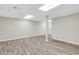 Spacious basement boasts new wood-look floors and a convenient wet bar area at 2401 Westland Way, Acworth, GA 30102