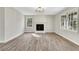 Inviting living room with stone fireplace, updated flooring, and abundant natural light at 2401 Westland Way, Acworth, GA 30102