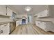 Well-lit kitchen with stainless steel appliances and stone countertops at 260 N Fayette Dr, Fayetteville, GA 30214