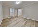 Inviting living room showcasing wood floors, crown molding, and natural light at 260 N Fayette Dr, Fayetteville, GA 30214