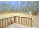 Expansive backyard view from the deck with a shed and goal posts, surrounded by woods at 3533 Saddlebrook Dr, Loganville, GA 30052