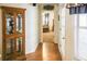 Hallway with wood floors and a view into the bedroom at 3533 Saddlebrook Dr, Loganville, GA 30052