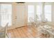 Bright sunroom filled with light and wicker furniture at 3533 Saddlebrook Dr, Loganville, GA 30052