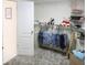 Carpeted walk-in closet featuring wire shelving and a full-length door at 3533 Saddlebrook Dr, Loganville, GA 30052