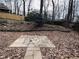 Large private backyard with stone paver patio at 4617 N Peachtree Rd, Dunwoody, GA 30338
