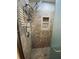 Updated shower with rainfall shower head and tiled surround at 4617 N Peachtree Rd, Dunwoody, GA 30338