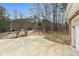Large driveway offers ample parking space, with a basketball hoop for recreational fun at 1007 Crown River Pkwy, Mcdonough, GA 30252