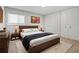 Comfortable bedroom with a bed, soft carpet, and white walls with stylish art pieces at 2153 Starfire Drive Ne Dr, Atlanta, GA 30345