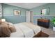 Cozy bedroom featuring a comfortable bed, stylish decor, and tranquil blue walls at 2153 Starfire Drive Ne Dr, Atlanta, GA 30345