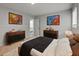 Inviting bedroom featuring a cozy bed, modern decor, and stylish art at 2153 Starfire Drive Ne Dr, Atlanta, GA 30345