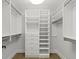 Walk-in closet with custom shelving and drawers, perfect for organized storage at 2153 Starfire Drive Ne Dr, Atlanta, GA 30345