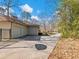 Attached two-car garage, long driveway, and mature landscaping for a well-kept exterior at 2153 Starfire Drive Ne Dr, Atlanta, GA 30345