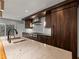 This kitchen boasts custom wood cabinets, stainless steel appliances and a center island at 2153 Starfire Drive Ne Dr, Atlanta, GA 30345