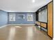 Spacious living room with hardwood floors, large windows, and custom built-in cabinetry at 2153 Starfire Drive Ne Dr, Atlanta, GA 30345