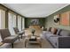 The living room with neutral walls and natural light highlighting the hardwood floors at 2153 Starfire Drive Ne Dr, Atlanta, GA 30345