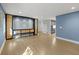 Open living room features custom wall features and cabinetry, with wood flooring at 2153 Starfire Drive Ne Dr, Atlanta, GA 30345