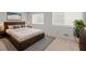 Bright main bedroom boasts modern decor, soft carpet, and natural light at 2153 Starfire Drive Ne Dr, Atlanta, GA 30345