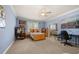 Blue bedroom with carpet, window, ceiling fan, and large mirror closet doors at 3017 Canton Pines, Marietta, GA 30068