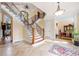 Grand foyer with staircase, hardwood floors and a chandelier at 3017 Canton Pines, Marietta, GA 30068