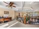 Open hallway with detailed ceiling, chandelier, wooden staircase and office nook at 3017 Canton Pines, Marietta, GA 30068