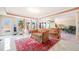Sitting area with tile floors, elegant sofas and lots of natural light at 3017 Canton Pines, Marietta, GA 30068