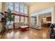 Bright living room with hardwood floors, large windows, and comfortable seating at 3017 Canton Pines, Marietta, GA 30068