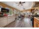 Bright sunroom featuring a breakfast nook, built-in appliances, and floor-to-ceiling windows at 3017 Canton Pines, Marietta, GA 30068