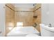 Neutral bathroom with a tiled shower and tub combination, plus a toilet at 4275 Ridgetop Dr, Ellenwood, GA 30294