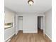 Bedroom with wood floors and open closet at 4275 Ridgetop Dr, Ellenwood, GA 30294