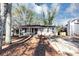 Charming single-story home with a well-maintained front yard and concrete driveway at 4275 Ridgetop Dr, Ellenwood, GA 30294