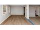 Spacious living room with hardwood floors and neutral walls showcasing the home's open layout at 4275 Ridgetop Dr, Ellenwood, GA 30294