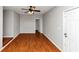 Living room with wood floors and ceiling fan at 4275 Ridgetop Dr, Ellenwood, GA 30294