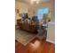 Cozy living room featuring hardwood floors, comfortable seating and a decorative fireplace at 1349 Orchard Park Dr, Stone Mountain, GA 30083