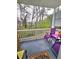 Relaxing patio with chairs and a view of lush trees, providing a peaceful outdoor setting at 1349 Orchard Park Dr, Stone Mountain, GA 30083