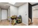Unfinished basement featuring tile floors and ample storage space and exterior access at 1701 Crowes Lake Ct, Lawrenceville, GA 30043