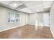Unfinished basement area with tile floors and single window, ready for customization at 1701 Crowes Lake Ct, Lawrenceville, GA 30043