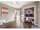 Cozy office space featuring a built-in desk with floral wallpaper and modern decor elements at 1701 Crowes Lake Ct, Lawrenceville, GA 30043