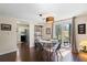 Dining area with hardwood floors and sliding glass doors leading to the backyard at 6038 Maryjo Ln, Norcross, GA 30093