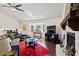 Bright living room featuring a fireplace, hardwood floors, and a bay window at 6038 Maryjo Ln, Norcross, GA 30093