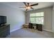 Bedroom featuring a desk and window with lots of natural light at 6935 Autumn Hills Dr, Cumming, GA 30028