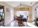 Sunlit breakfast nook features a floral valance and ample space for a cozy dining experience at 6935 Autumn Hills Dr, Cumming, GA 30028