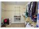 Spacious walk-in closet with wire shelving and ample storage space at 6935 Autumn Hills Dr, Cumming, GA 30028
