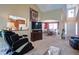 Spacious living room features an open floor plan, high ceilings and plenty of natural light at 6935 Autumn Hills Dr, Cumming, GA 30028